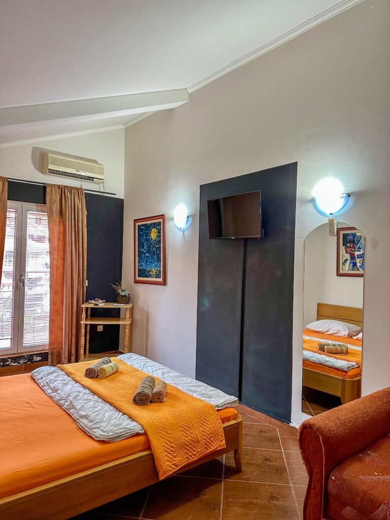 Studio 7 at ApartMonte in Bečići, Budva, with double bed, TV, sofa bed and balcony access