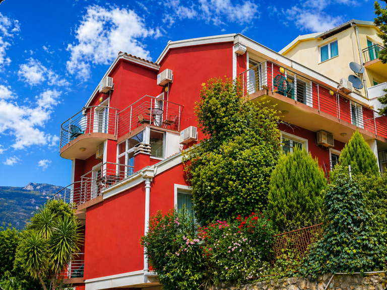Exterior view of ApartMonte family apartments with balconies in Bečići, Budva, Montenegro
